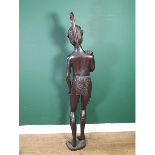 623 - A carved Gambian female Figure with pierced headdress, 4ft 2in H. (R2).