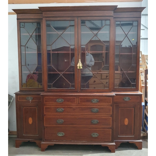 884 - A reproduction mahogany Breakfront Bookcase, the top with astragal glazed doors  enclosing adjustabl... 