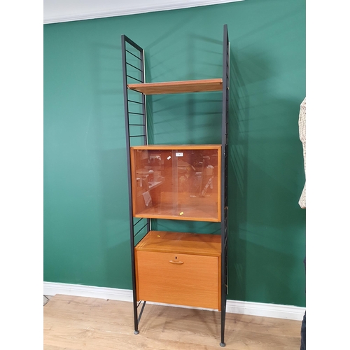 10 - A Ladderax Unit with glass fronted section, fall front cupboard and shelf (R1)