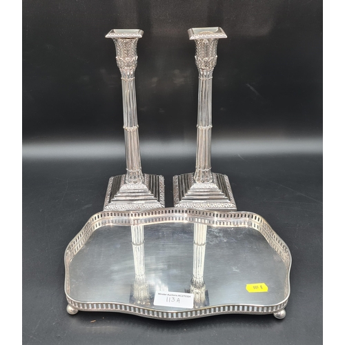 113A - A pair of plated Candlesticks with cluster columns, leafage capitals on square bases, and a small Ga... 