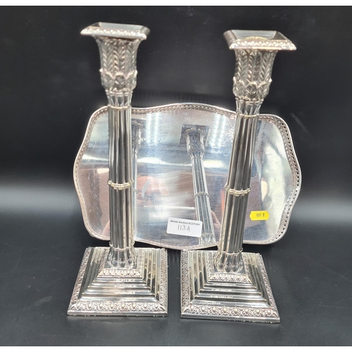 113A - A pair of plated Candlesticks with cluster columns, leafage capitals on square bases, and a small Ga... 