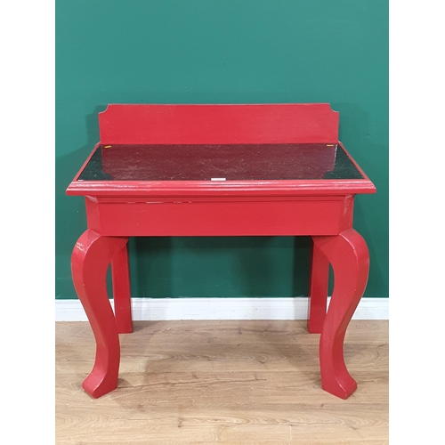 12 - A red painted Console Table with shaped raised back, inset granite top, on shaped front supports, 2f... 