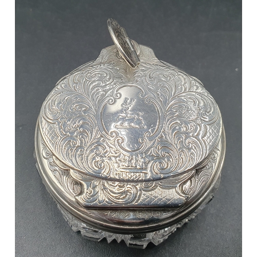 120 - A Victorian silver lidded circular cut glass Inkwell with leafage scroll engraving, London 1850, gla... 