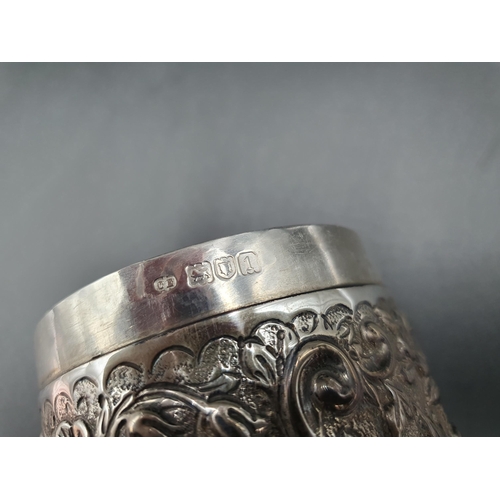 123 - An Edward VII silver cylindrical Box and Cover with bird and floral scroll embossing, London 1906