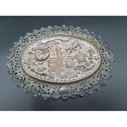 124 - An Indian silver oval Panel embossed and chased central building, birds, airship, etc, 8 x 6in