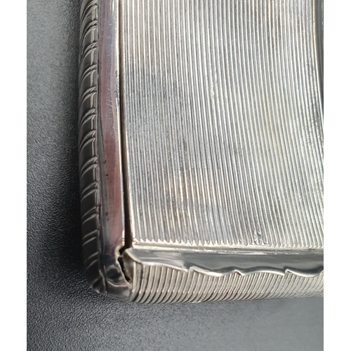 140 - A Continental silver curved Snuff Box with reeded design