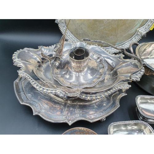 142 - Plated Items: two circular Salvers, Chamber Candlestick, pair of Salts, Mustard Pot, Souffle Dish, p... 