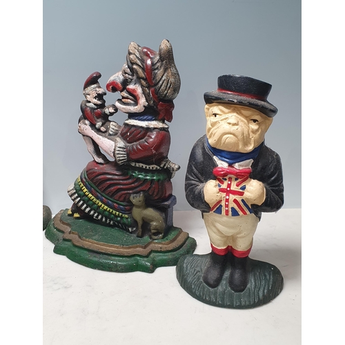 19 - Four cast metal Doorstops in the form of Punch and Judy, Laurel and Hardy and a British Bulldog (R3)