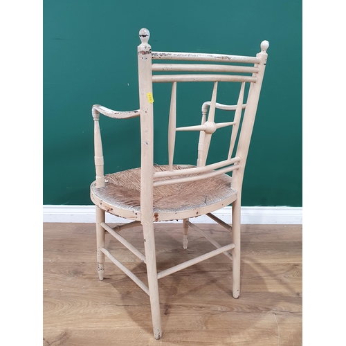 24 - An antique cream painted Sussex type Elbow Chair 2ft 11in H x 1ft 8in W (R4)