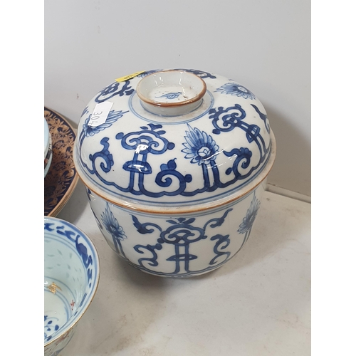 304 - A Chinese blue and white lidded Jar, Soup Bowls and Collector's Plates (R5)