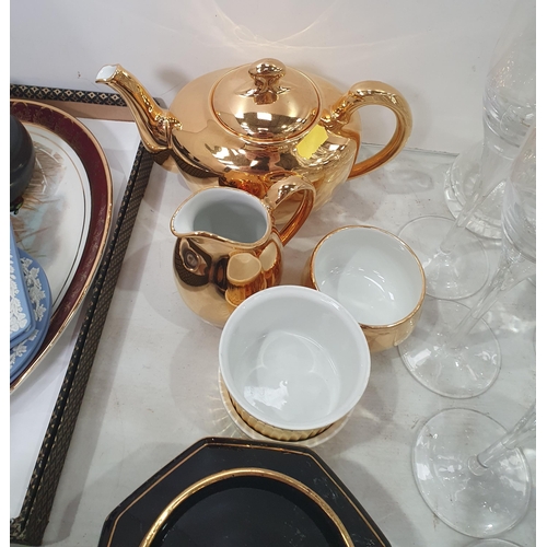 323 - A Royal Worcester gold Tea Pot, Jug and Ramekin Dishes, Royal Commemorative Mugs, various cut glass ... 