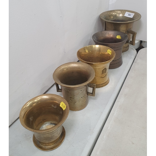 363 - An antique bronze Mortar and four brass Mortars (R5)