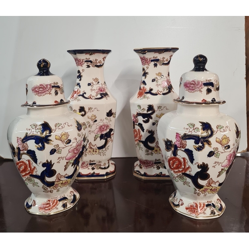 387 - A pair of Mason's Mandalay Lidded Vases with gilt and floral designs, 9