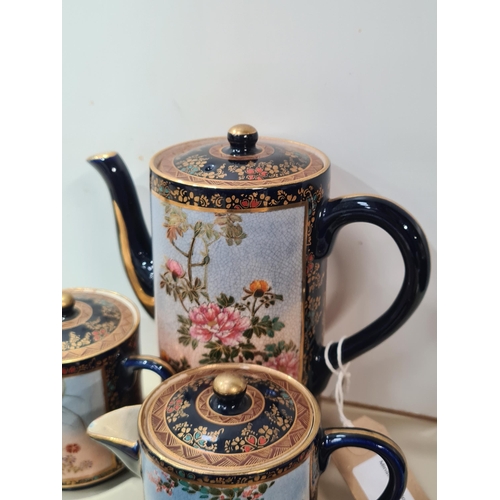 388 - A Japanese blue and gilt floral decorated Coffee Service including, Coffee Pot, Milk Jug, Sugar Bowl... 