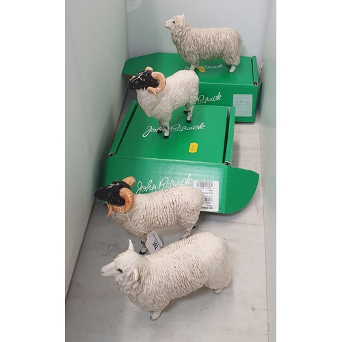 392 - A boxed Beswick Cotswold Sheep, another unboxed and two Scottish Blackface (R5)