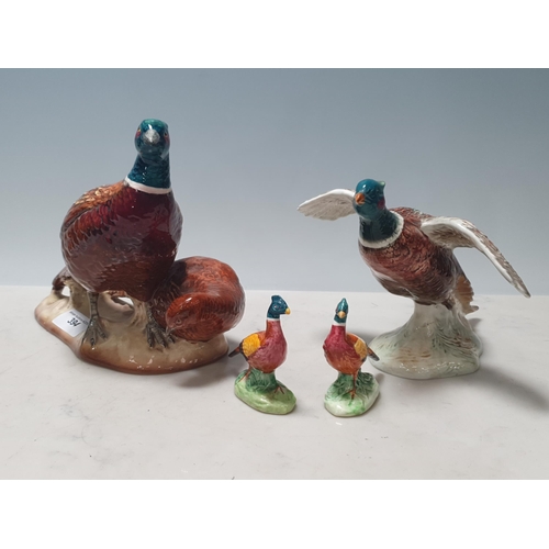 394 - A pair of Beswick Pheasants Model No 2078, a Beswick Pheasant 