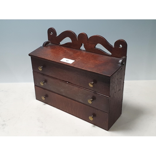 41 - A 19th Century Welsh oak Candle Box with pierced and shaped surmount, two dummy drawers and central ... 