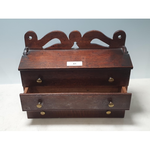 41 - A 19th Century Welsh oak Candle Box with pierced and shaped surmount, two dummy drawers and central ... 