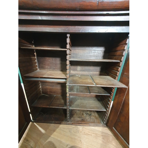 44 - An 18th Century fruitwood Cupboard with pair of fielded panelled doors enclosing an arrangement of a... 