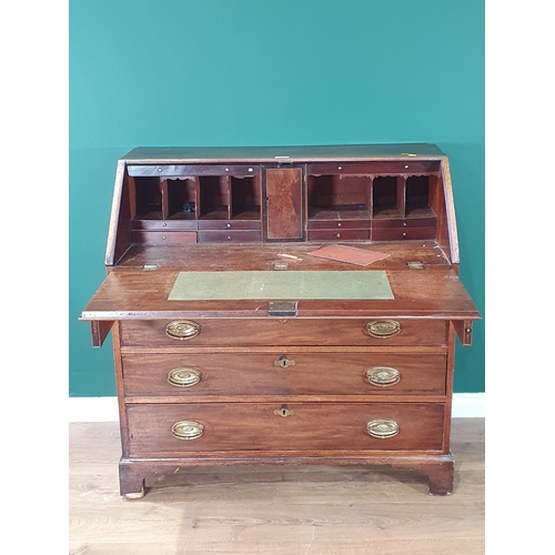 452 - An antique mahogany Bureau, the fall front enclosing pigeon hole and drawer interior, with inset fel... 