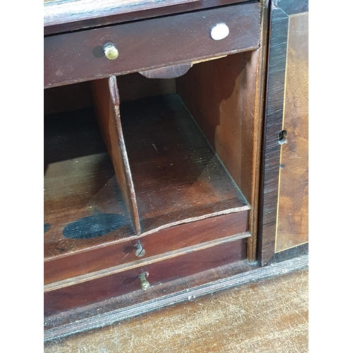 452 - An antique mahogany Bureau, the fall front enclosing pigeon hole and drawer interior, with inset fel... 