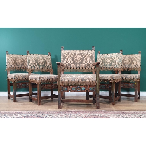 460 - A set of five Oak chairs four singles and one carver with studded upholstered seats with carved rose... 