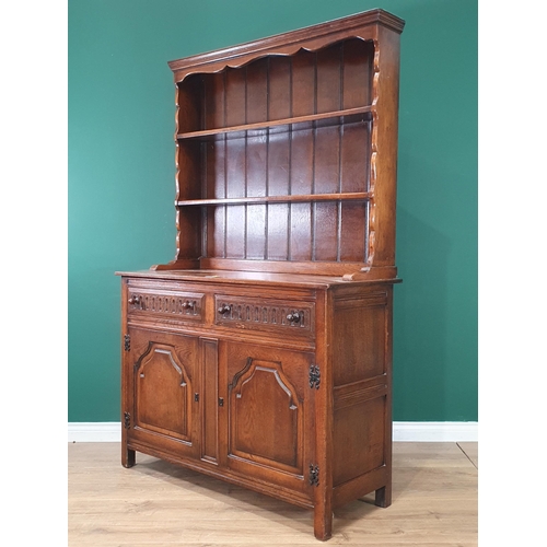 461 - A 19th Century Oak Dresser and Rack fitted two drawers above two cupboard doors. 6ft 2