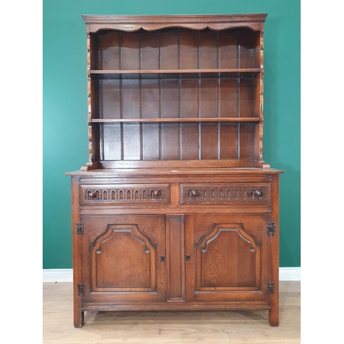 461 - A 19th Century Oak Dresser and Rack fitted two drawers above two cupboard doors. 6ft 2