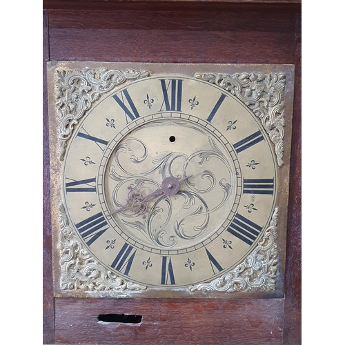 47 - An antique 30 - Hour Long Cased Clock, with square brass face with scrolled decoration, in oak case,... 