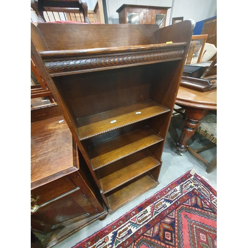 471 - A Mahogany cupboard fitted single drawer, Mahogany bookcase, Oak bookcase and a Pine bookcase