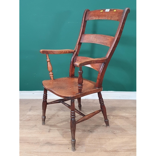 474 - An Oak arm chair with H stretcher