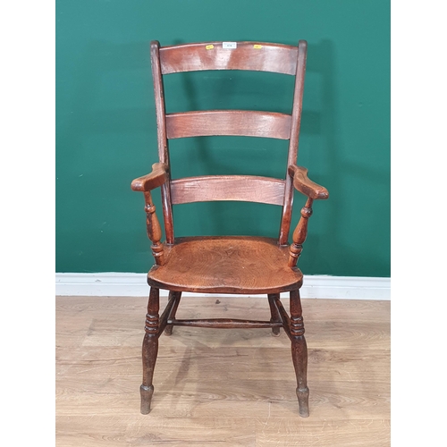 474 - An Oak arm chair with H stretcher