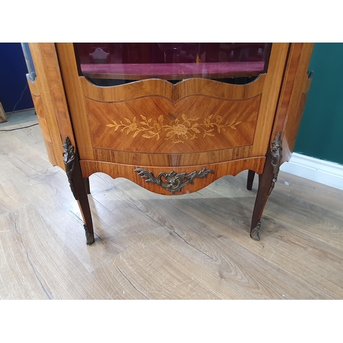 481 - A 19th century bow fronted inlaid display cabinet fitted three pink upholstered shelves 4ft 8