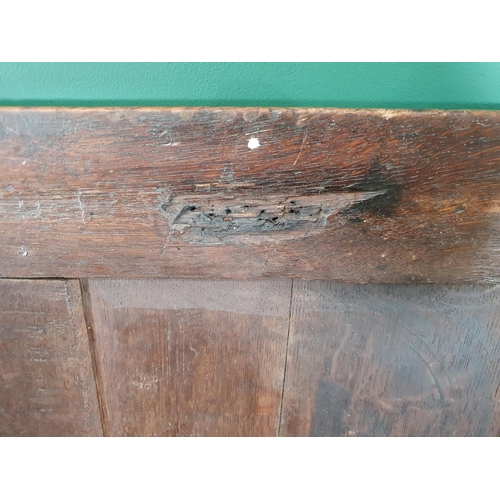 513 - A 17th Century oak Coffer with sunken three panel lid above carved frieze and three panel front 4ft ... 