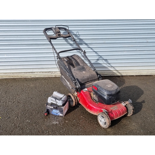 522 - A Mountfield battery operated Lawn Mower with battery and charger