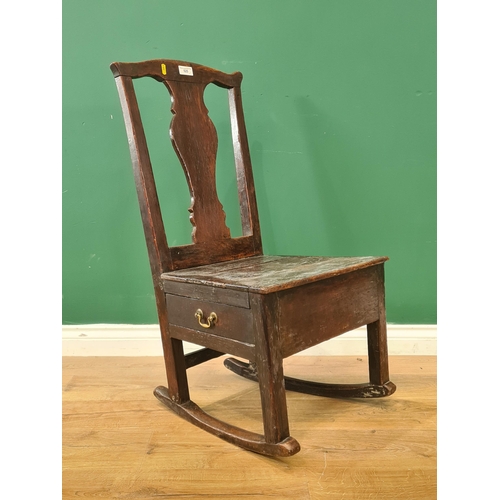 525 - An 18th Century oak Rocking Lambing Chair with box base fitted side drawer 2ft 10in X 1ft 7in W (R6)