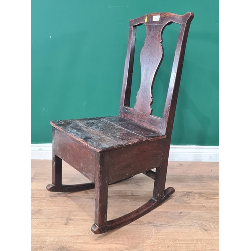 525 - An 18th Century oak Rocking Lambing Chair with box base fitted side drawer 2ft 10in X 1ft 7in W (R6)