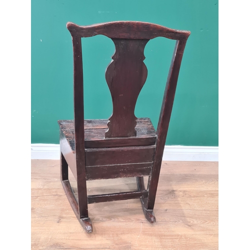 525 - An 18th Century oak Rocking Lambing Chair with box base fitted side drawer 2ft 10in X 1ft 7in W (R6)