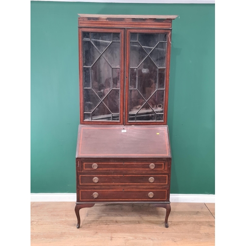 526 - An Edwardian mahogany and inlaid Bureau Bookcase, the base fitted three drawers raised on cabriole s... 