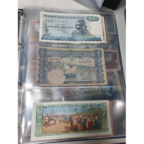 539 - An Album of world Banknotes, to include examples from Cyprus, China, Hong Kong, Norway, Japan etc. a... 