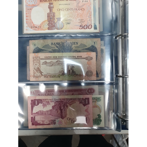 539 - An Album of world Banknotes, to include examples from Cyprus, China, Hong Kong, Norway, Japan etc. a... 