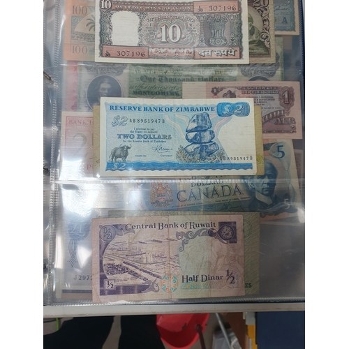 539 - An Album of world Banknotes, to include examples from Cyprus, China, Hong Kong, Norway, Japan etc. a... 