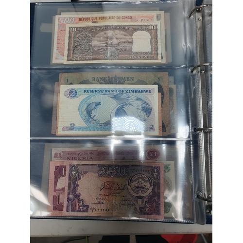 539 - An Album of world Banknotes, to include examples from Cyprus, China, Hong Kong, Norway, Japan etc. a... 