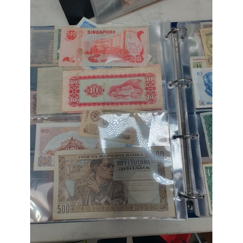 539 - An Album of world Banknotes, to include examples from Cyprus, China, Hong Kong, Norway, Japan etc. a... 