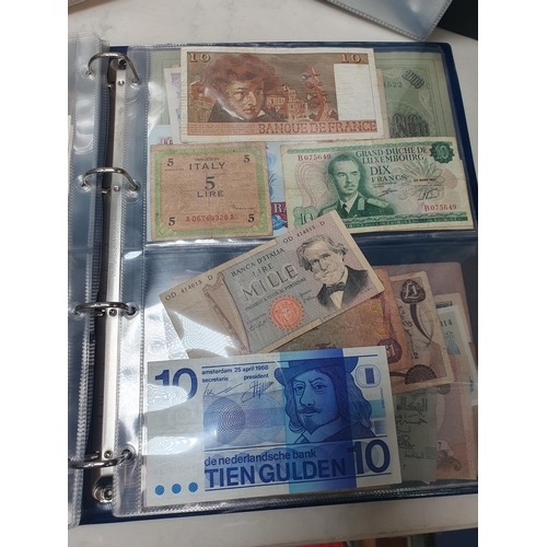 539 - An Album of world Banknotes, to include examples from Cyprus, China, Hong Kong, Norway, Japan etc. a... 