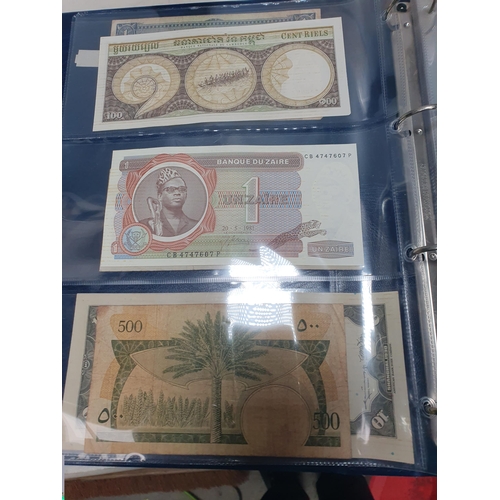 539 - An Album of world Banknotes, to include examples from Cyprus, China, Hong Kong, Norway, Japan etc. a... 