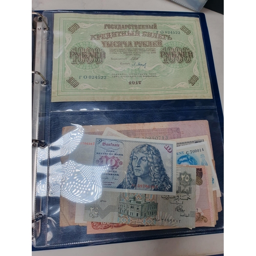 539 - An Album of world Banknotes, to include examples from Cyprus, China, Hong Kong, Norway, Japan etc. a... 