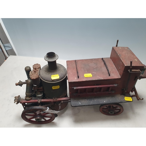 546 - An early 20th Century Model of  a horse drawn Steam Pumper Fire Engine, with metal engine and chassi... 