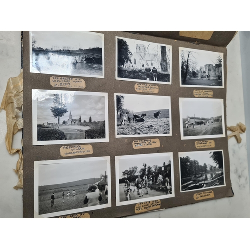 547 - Two Photograph Albums containing an extensive collection of photographs from cycling clubs trips aro... 