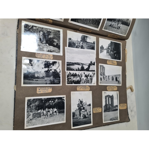 547 - Two Photograph Albums containing an extensive collection of photographs from cycling clubs trips aro... 